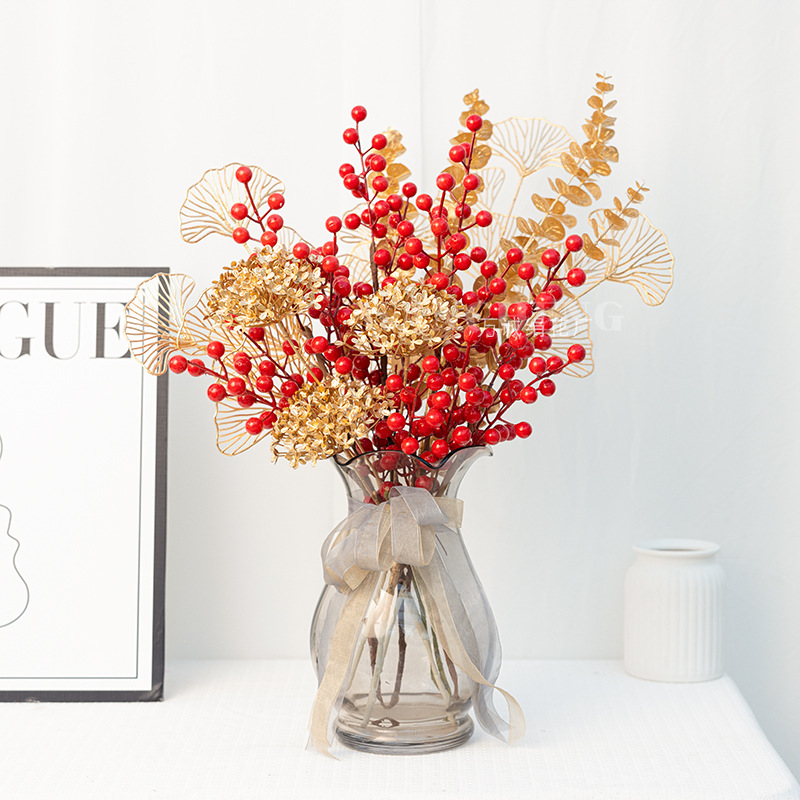 Flores artificiales doradas para Navidad