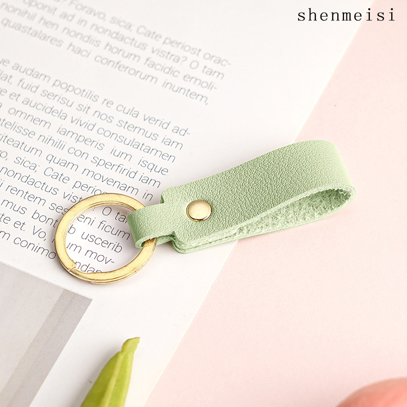 Keychain de cuero pu transfronterizo estilo simple de mano hebilla de cuero logotipo imprimible colgante de cuero llavero para hombres y mujeres