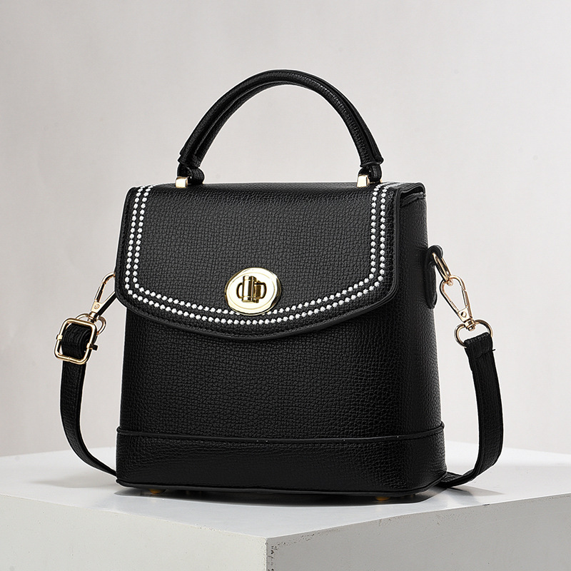 Bolso de mujer nuevo nicho de diseño texturizado bolso de hombro de moda moda bolso de mano práctica mochila bolsas