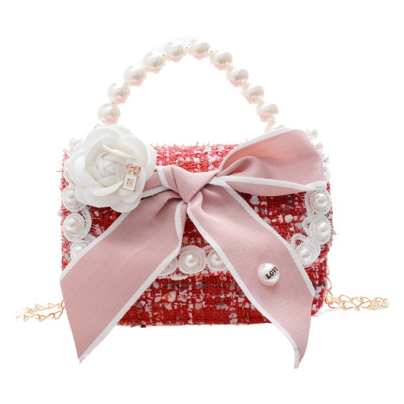 Bolso al por mayor para niños 2021 nuevo Xiaoxiang arco perla bolso de mano estilo occidental niña princesa cadena bolsa de mensajero