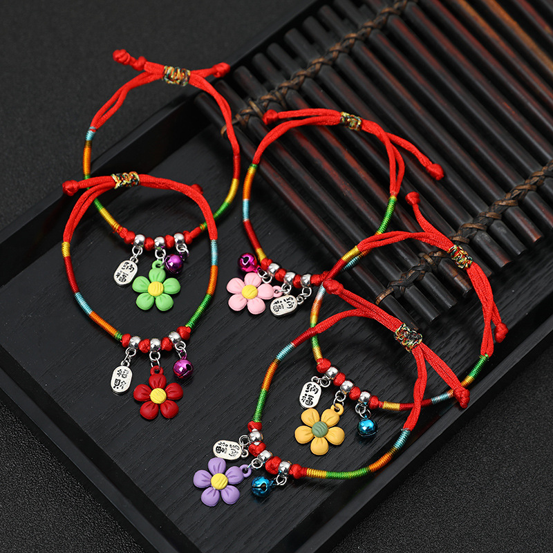 Woven red rope bracelet flower-shaped for children and adults…