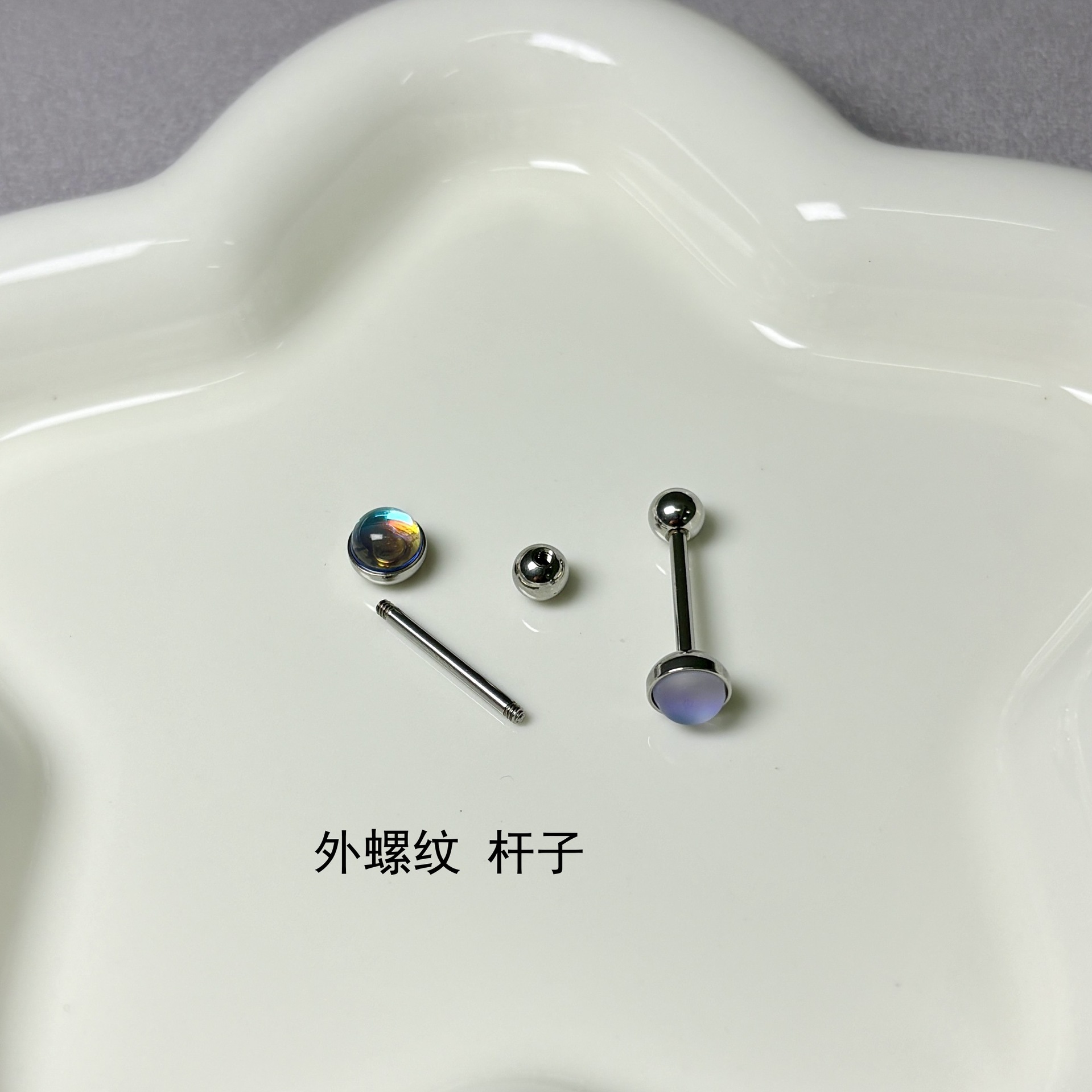 Silver pointed spike labret stud material detail