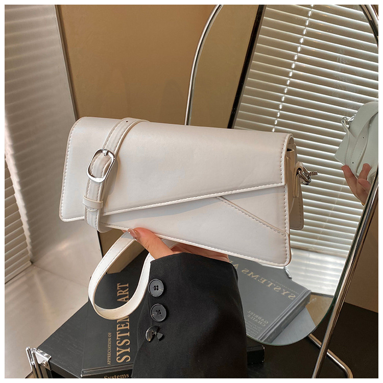 Bolso de diseño de nicho para mujeres 2025, verano nuevo estilo coreano bolso cuadrado simple temperamento casual bolso de hombro de mujer