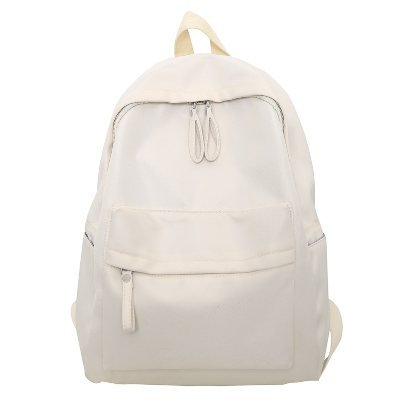 Venta al por mayor transfronteriza 2023 nueva mochila de pareja literaria de nailon simple y versátil mochila de escuela para estudiantes de gran capacidad
