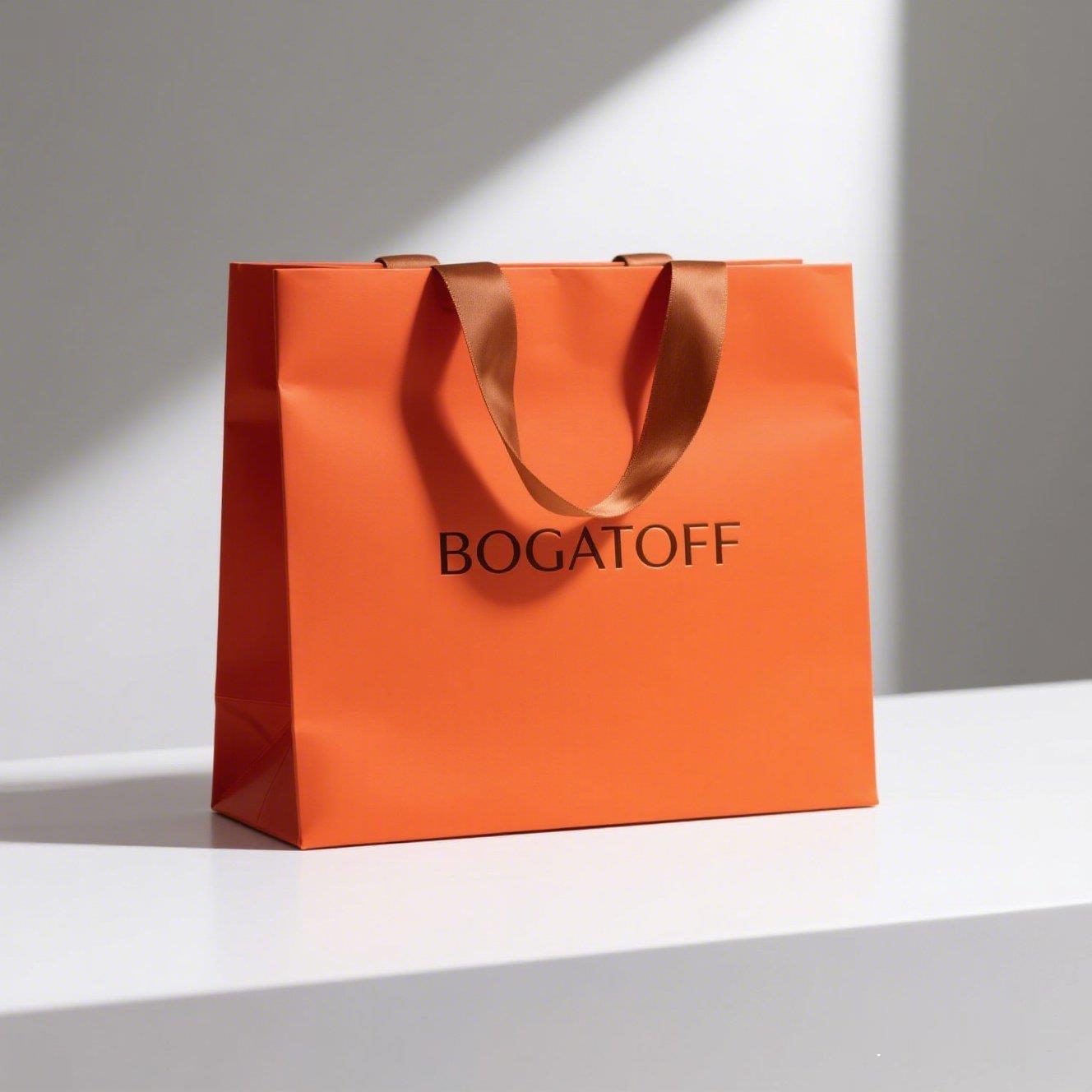 服装店手提袋高级感礼品袋礼物袋批发纸袋收納批发拎手袋装创意印