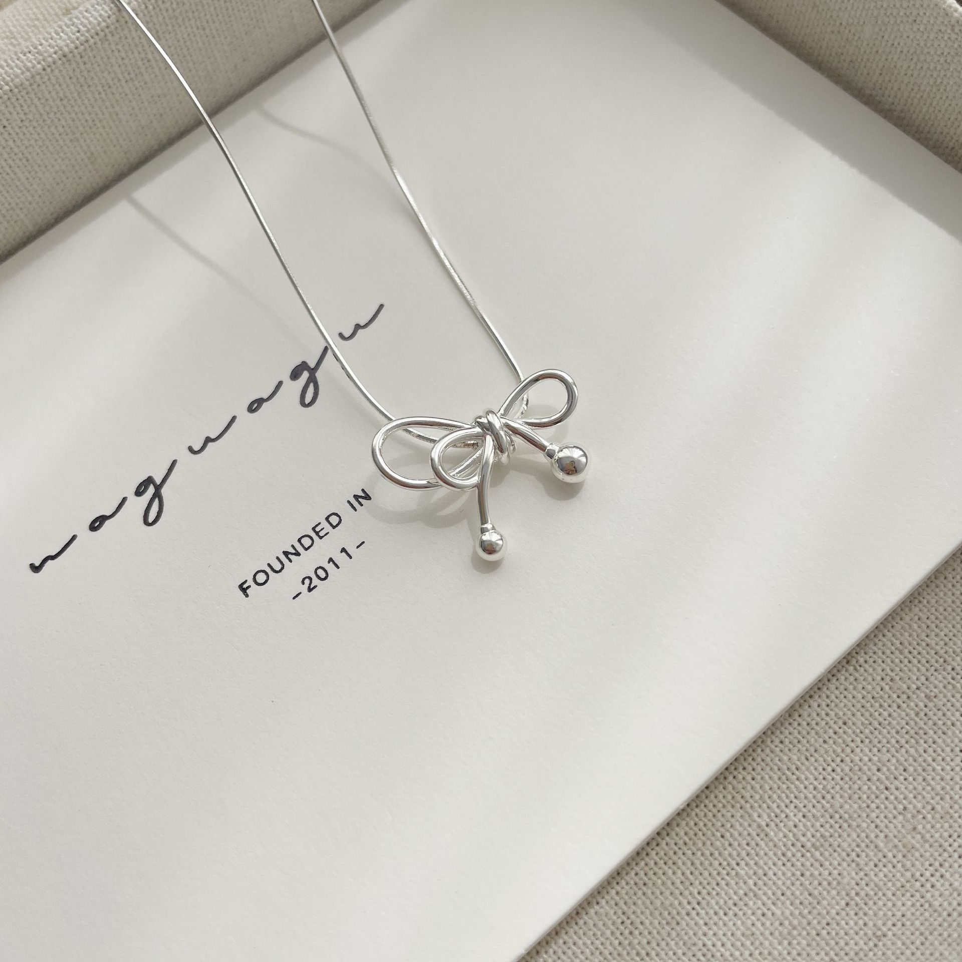 Sterling Silver Simple Style Classic Style Bow Knot Plating Pendant Necklace display picture 1