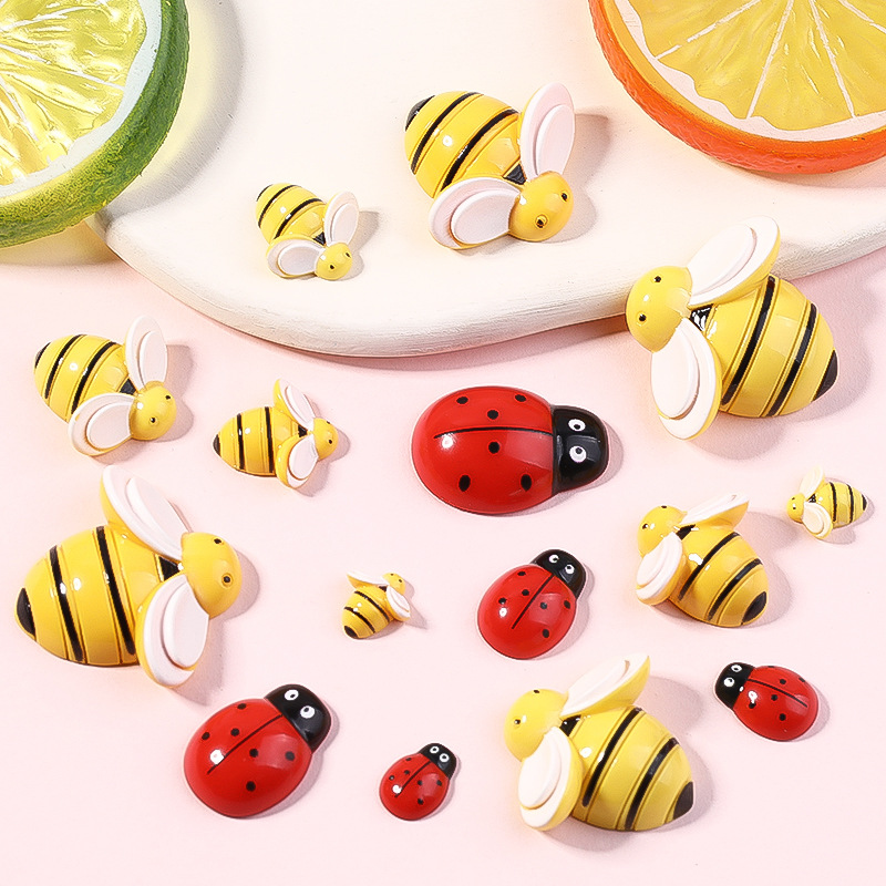 Resina accesorios de dibujos animados abeja tocado DIY accesorios de la joyería niños horquilla crema epoxi teléfono caso parche