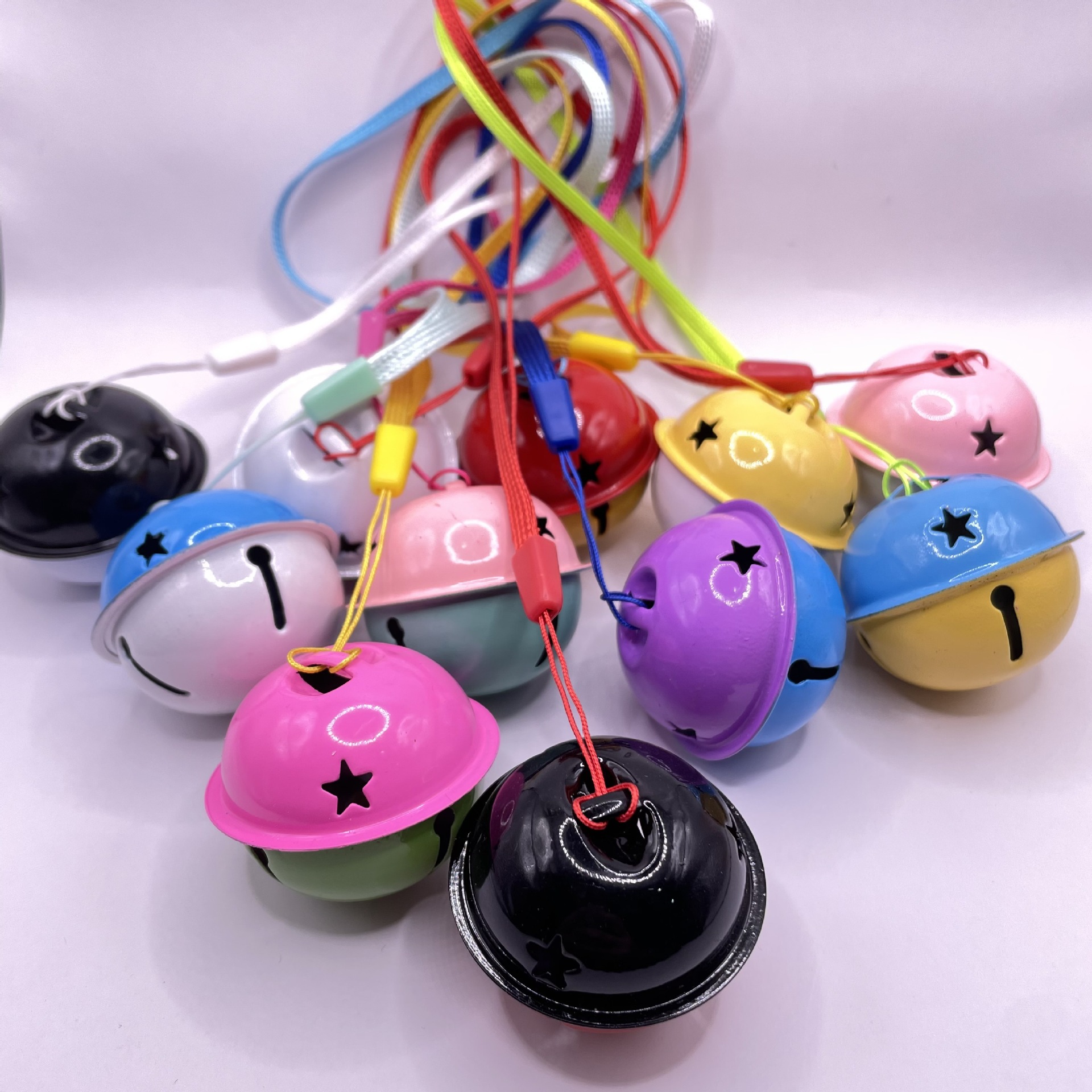 Two-color small bell with rope