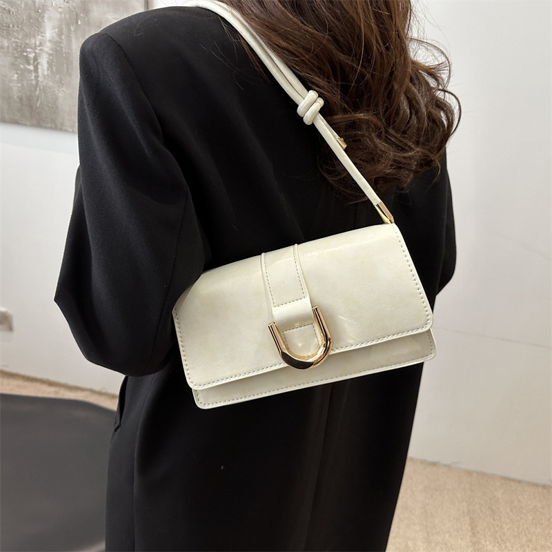 Diseño francés de nicho retro bolso debajo de la axila para mujeres 2024 otoño y invierno nuevo paquete de mano de hombro de alta calidad