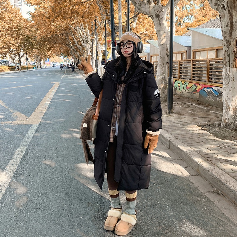 Ropa de invierno de grafito para hombres y mujeres, ropa de algodón coreana suelta y gruesa, chaqueta de algodón larga sobre la rodilla en stock