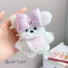 Розовый кролик со слюнявчиком