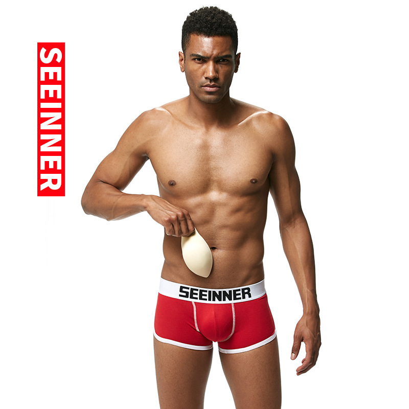 Ropa interior masculina para exportación en AliExpress y Amazon, calzoncillos bóxer de algodón con relleno en la cadera, color liso, nuevo diseño transpirable que realza la cadera.