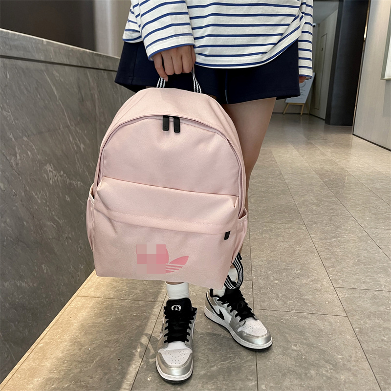New style backpack for men and women, school bag for junior high school, sports backpack, cross-border college student large-capacity simple casual backpack