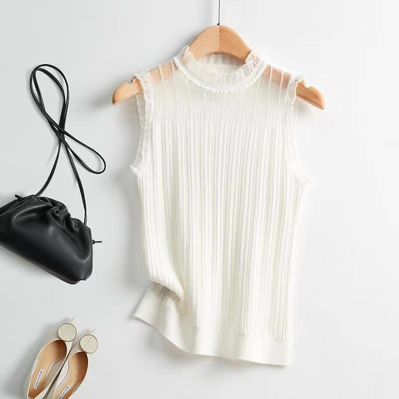 ファッションは春夏の新型の袖なしのウールのメリヤスレースに合わせて、女性のベストを身につけて痩せた純色の底のシャツを見せます。|undefined