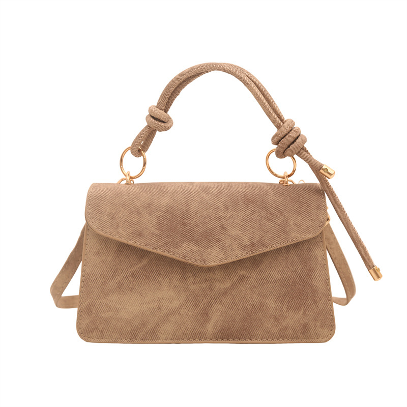 Bolso público pequeño para mujeres 2026 nuevo bolso cuadrado de alta calidad sensación de diseño retro bolso de hombro simple bolso de mano