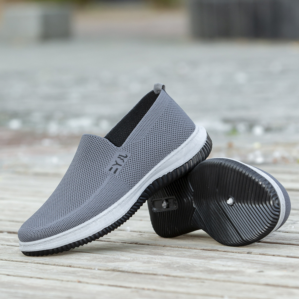 Zapatos deportivos de hombre verano nuevos zapatos de hombre transpirables de tela de malla superficial, zapatos casuales de hombre con un pedal
