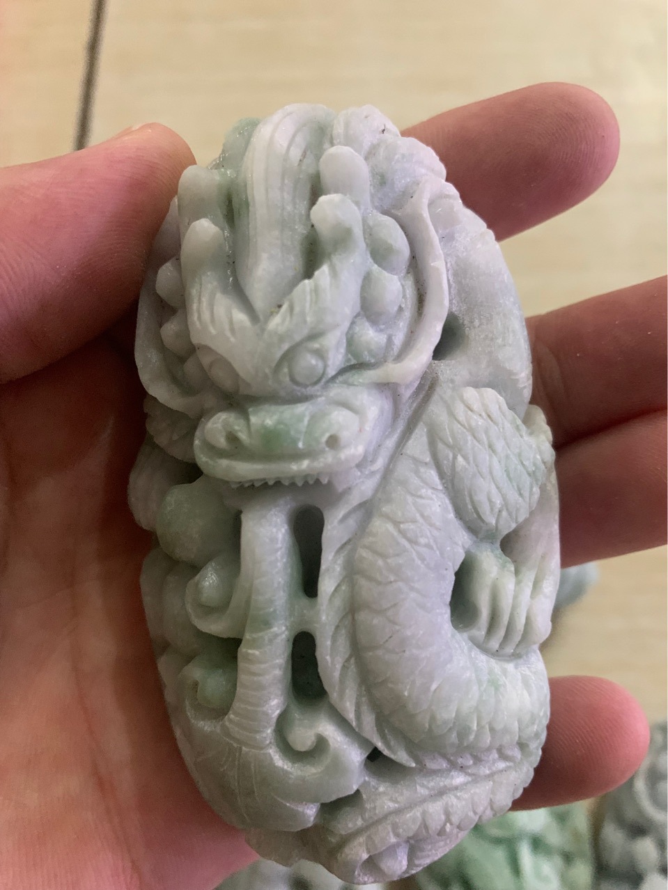 Manufactor Direct selling natural Emerald Dragon Hand playing pieces Arts and Crafts Carving Refinement moral auspicious Antique Pendant wholesale