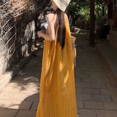 クロスボーダー 2025 新しい黄色のタッセルサスペンダードレス女性の夏のスタイル超見栄えの良い海辺の休暇ロングスカート