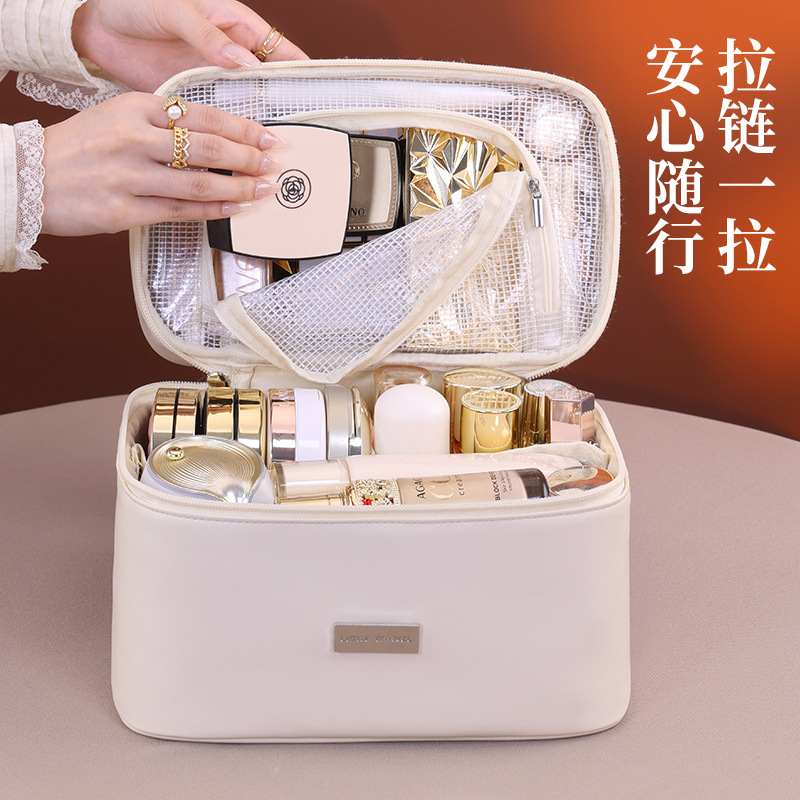 Bolsa de maquillaje de división para mujeres 2025 nuevo paquete de maquillaje de alta gama de gran capacidad bolsa de almacenamiento portátil de viaje bolsa de lavado de mano