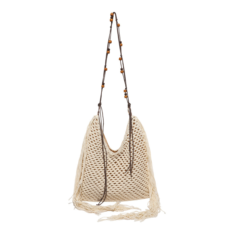 Bolso de vacaciones junto al mar 2025 verano nuevo estilo bolso de hombro tejido con flecos bolso de mensajero de gran capacidad mujer