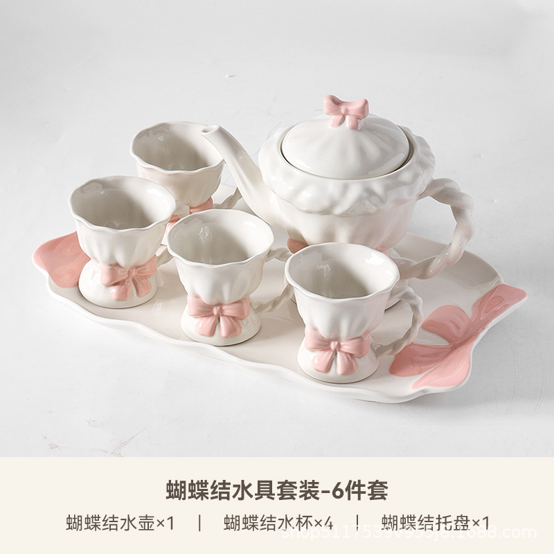 Una olla de cerámica, cuatro tazas de juego de té, caja de regalo de inauguración de la casa, lazo pintado a mano, taza de té de la tarde, regalo de boda