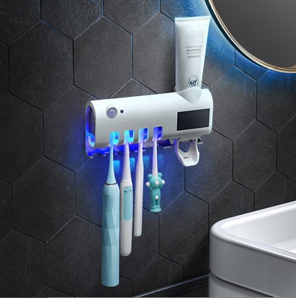 Fuente fabricante inteligente cepillo de dientes esterilizador de lámpara nocturna eléctrica sin perforación pared extrusor de pasta de dientes