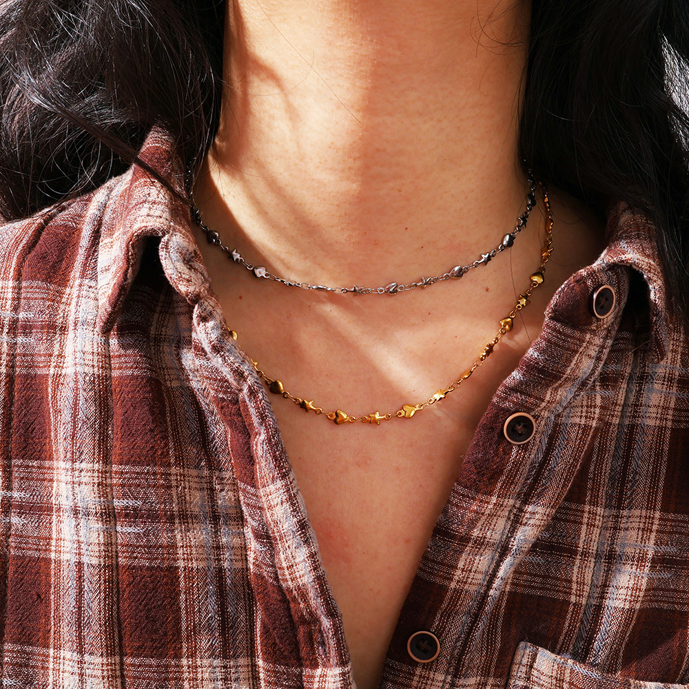 Acero de titanio de lujo ligero francés 18K oro real galvanoplastia amor estrella de cinco puntas collar transfronterizo pulsera INS juego de joyería al por mayor