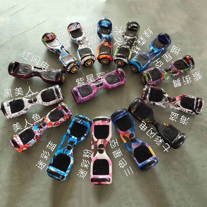 Vehículo de equilibrio eléctrico inteligente transfronterizo de 7 pulgadas para niños paralelos, automóvil somatosensorial de dos ruedas retorcido universal para adultos al por mayor