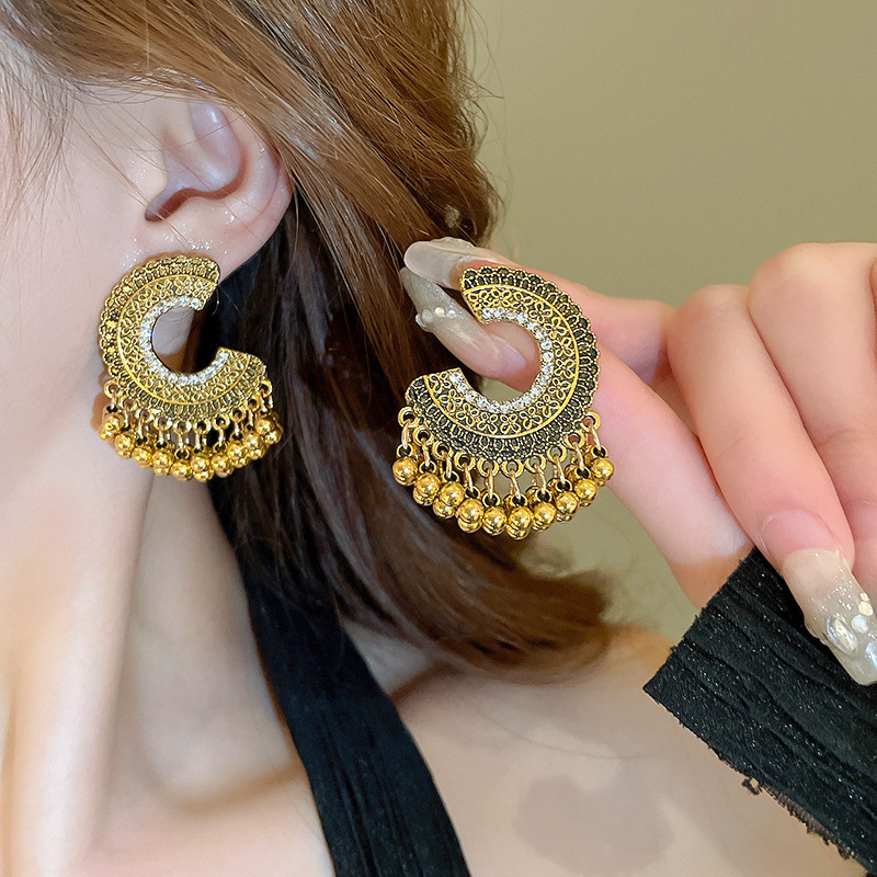 Pendientes de borla de media luna de fénix de estilo étnico Pendientes de diseño retro de nicho Pendientes de lujo ligero femenino de verano