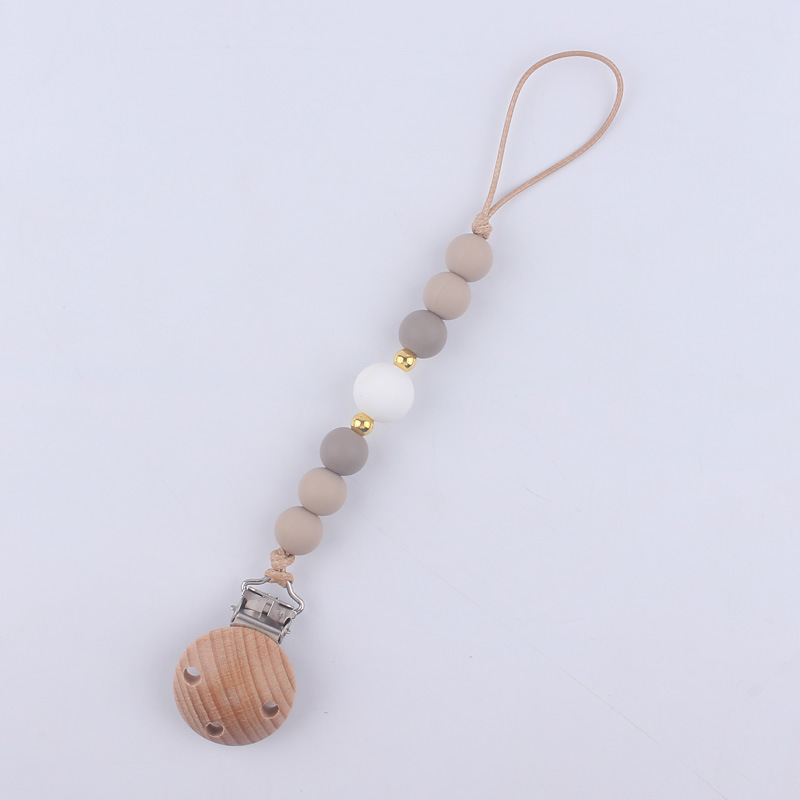 Nuevos suministros para bebés Beech clip calmante bebé DIY cuentas de silicona mordedura molar Cadena de pezón cadena anti-caída
