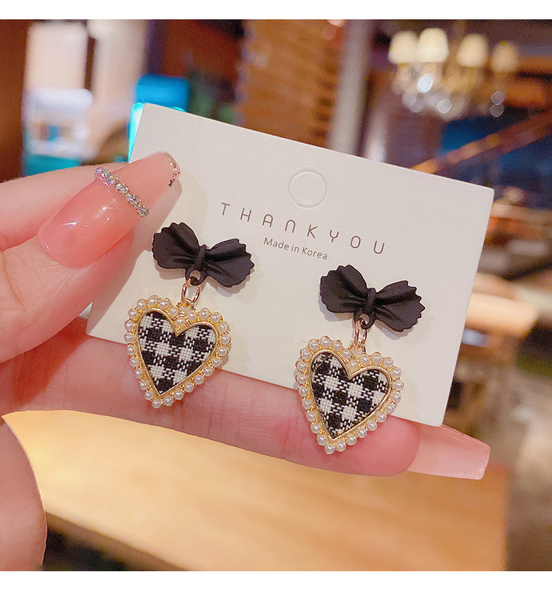 Korean autumn and winter black and white lattice bow earrings female wholesalepicture3