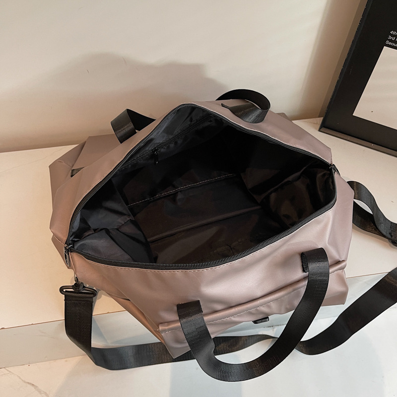 Bolsa de viaje transfronteriza de gran capacidad para mujeres nueva bolsa de almacenamiento portátil deportivo de acondicionamiento físico bolsa de viaje de negocios