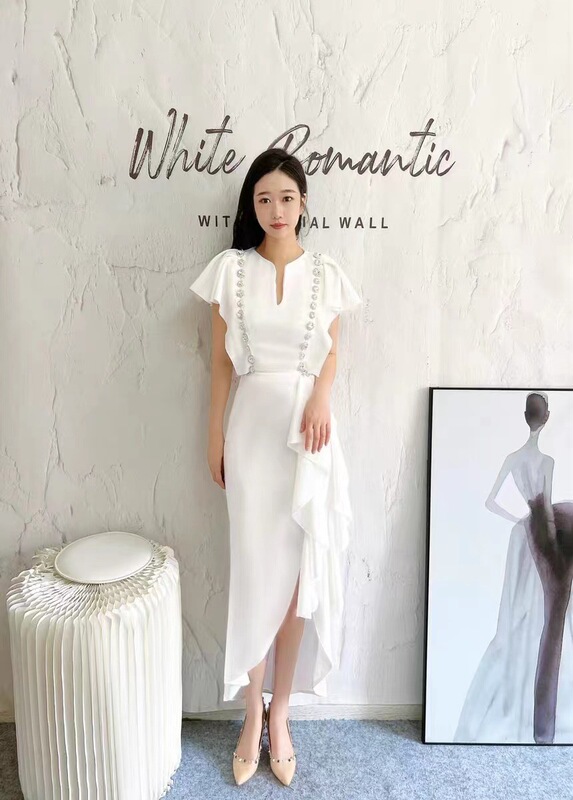 Spring and summer white evening dress women's high-end light luxury niche temperament dress design sense high-end sense host Long