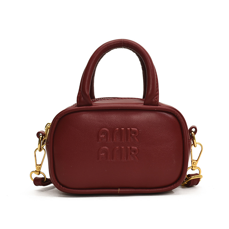 Bolsa desnuda de color rojo vino