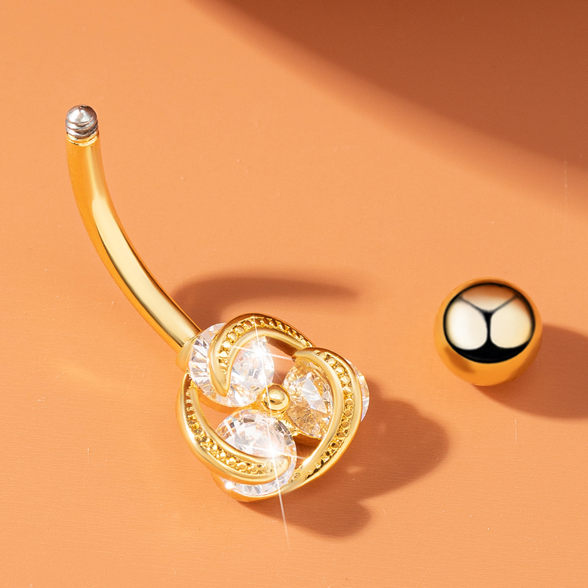 Piercing ombelico circolare con tre zirconi per donna_voghion.com