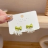 Green earrings with bow, flowered