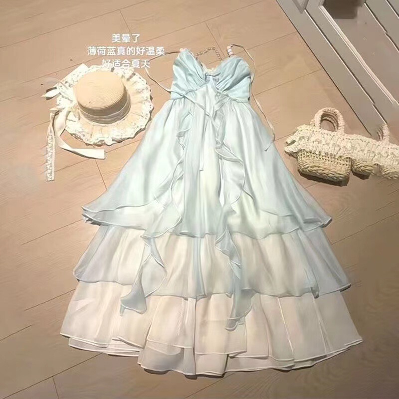フレッシュでスイートな海辺のリゾートスタイルの女性用サスペンダードレス2025夏の新しい雰囲気のバックレスロングスカート|undefined
