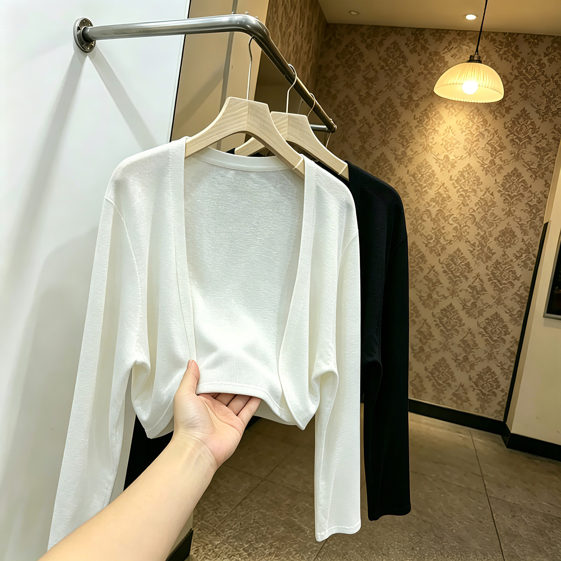 White short-sleeved versatile knitted sun protection cardigan, thin summer style, perfect as an outer layer over a slip dress, stylish cover-up.