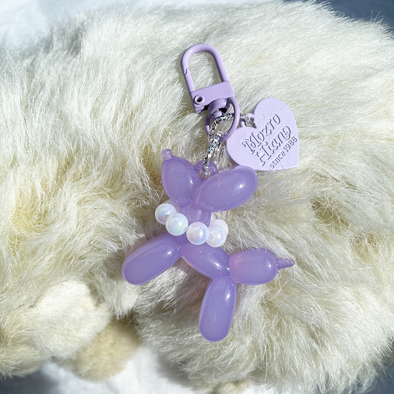 Pequeño Libro Rojo mismo lindo jalea globo láser perro llavero colgante colorido cachorro de dibujos animados teléfono llavero