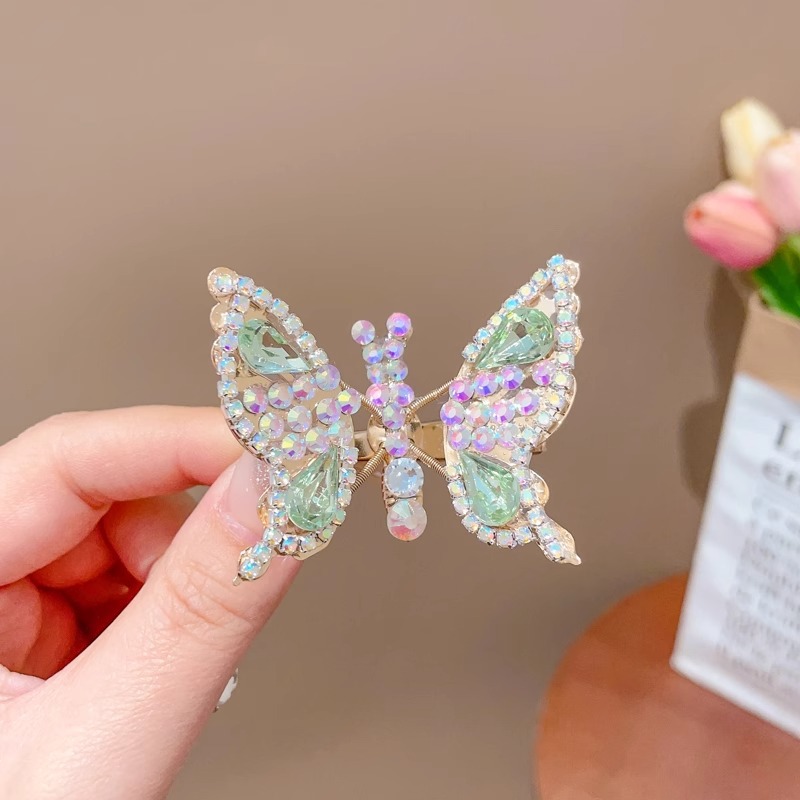 Clip de cabello de mariposa móvil ultra inmortal electrónica azul tulle perla clip de boca de pato decoración accesorios de playa clip tocado