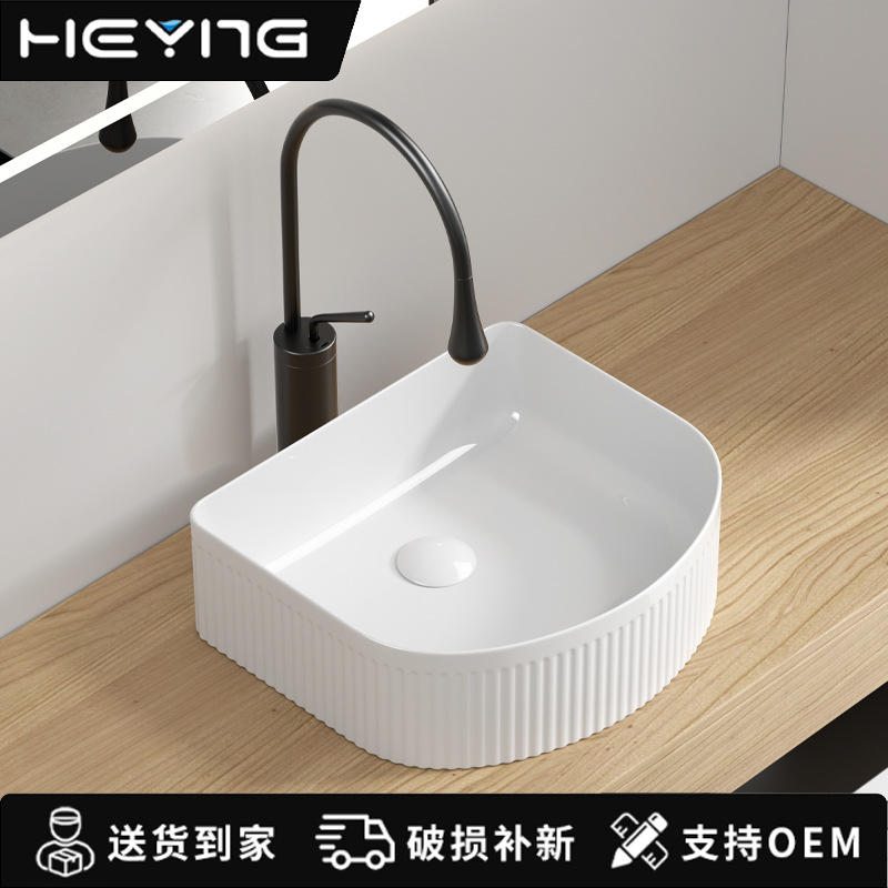 Art Desktop lavabo nuevo borde delgado lavabo cerámico anti-contaminación lavabo en la mesa lavabo hogar lavabo único al por mayor