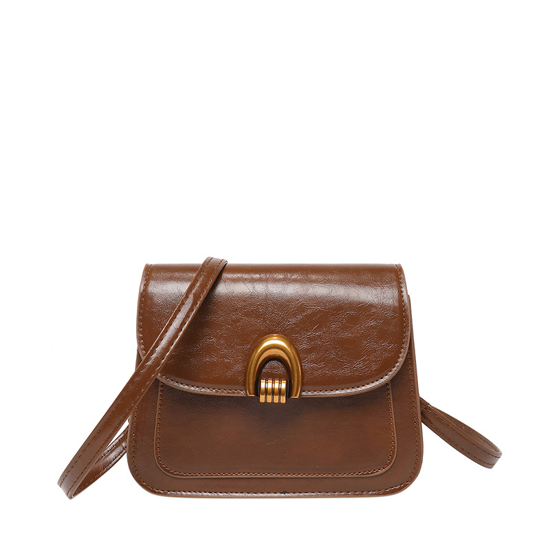 2025 nueva moda temprana primavera bolsa de silla textura casual gran capacidad retrógrada piel de cera de aceite de hombro mochila para mujeres