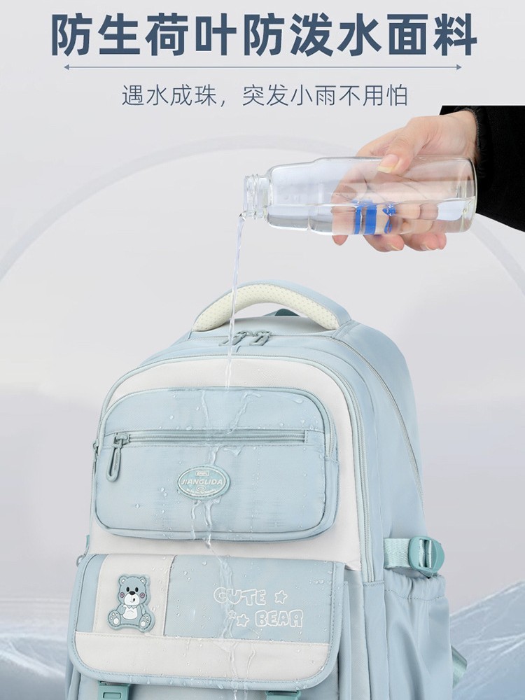 Nueva mochila de escuela secundaria de niñas de tres a seis grados, mochila de moda, mochila ligera de gran capacidad.