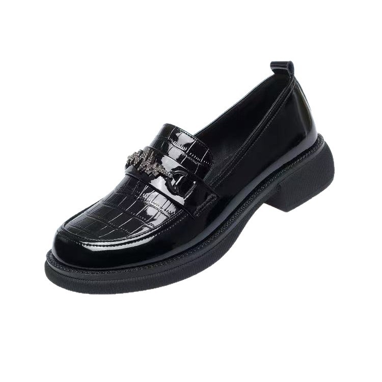 Modas profundas zapatos individuales primavera y otoño 2026 nuevos zapatos de cuero de cabeza redonda tacones gruesos versátiles zapatos de estilo británico para mujeres