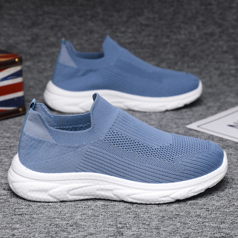 Zapatos de hombre transfronterizos perezosos de un pie 2025 primavera y verano malla zapatos de hombre zapatos casuales zapatos de todo fósforo de color sólido de fondo suave tejido volador