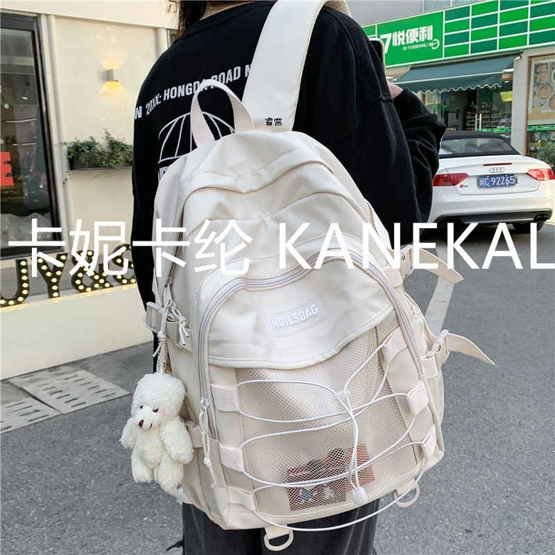 Personalidad de la tendencia de la mochila escolar de cuerda cruzada para estudiantes universitarias coreanas ins estilo japonés de la universidad Kanika Kanekalon