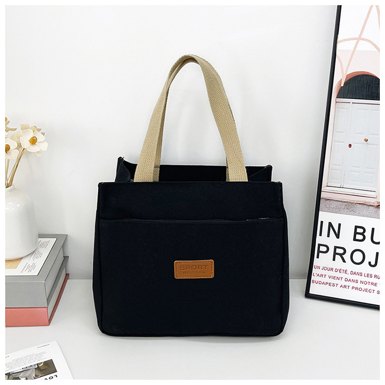 New wholesale fashionable and high-quality canvas handbag, simple and portable, easy to carry for going out, versatile lunch box and bento bag undefined