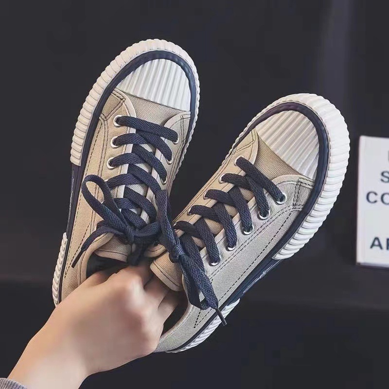 2023 primavera y otoño nuevos zapatos de lona estudiantes femeninos zapatos de tablero con cordones zapatos de galletas zapatos transpirables zapatos casuales de mujer zapatos blancos