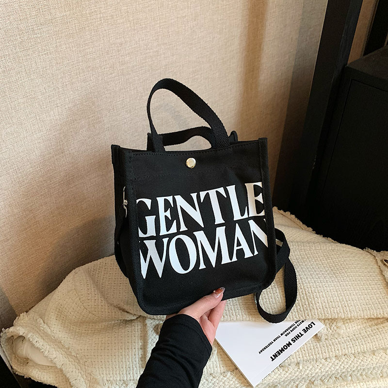 Moda rayas bolsa de lona para mujeres 2023 nueva carta impresión portátil bolsa de compras bolso de hombro al por mayor