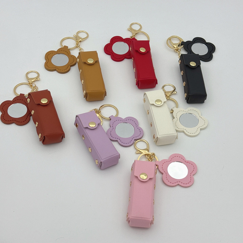 Flor pequeño espejo llavero creativo transfronterizo portátil mini cuero sobre rojo spot llavero bolso colgante